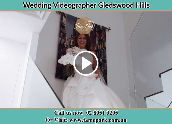 The Bride walking downstairs Gledswood Hills NSW 2557